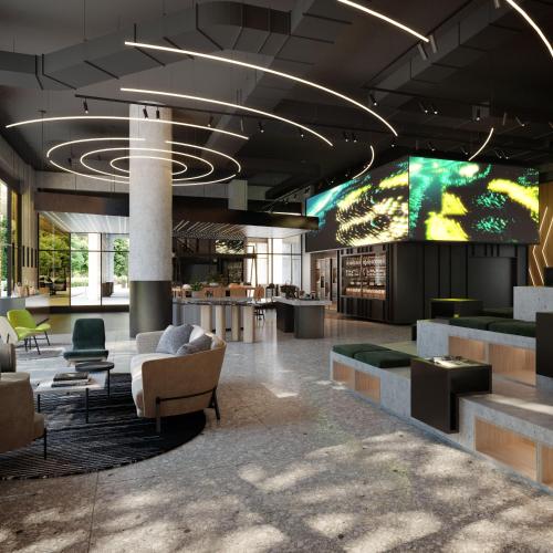 a lobby with couches and a large screen at SIRO Boka Place in Tivat
