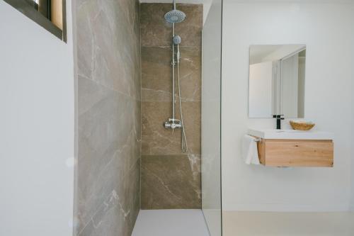 a bathroom with a shower and a sink at Moon Dreams Cullera in Cullera