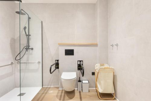 Koupelna v ubytování Turía Flats by Nomad Host