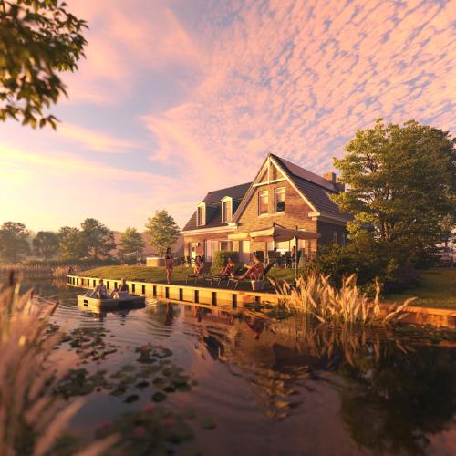 a house on a river with a boat in the water at Dormio Water Resort Medemblik in Opperdoes