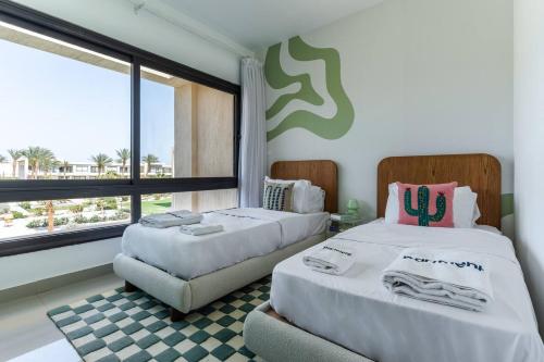 Ένα ή περισσότερα κρεβάτια σε δωμάτιο στο Eclectic Apartment At G-cribs
