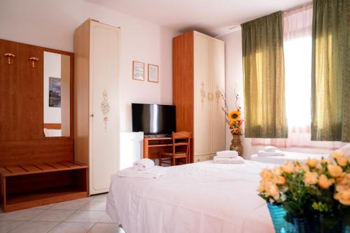 Posteľ alebo postele v izbe v ubytovaní Hotel New Aurora Venice