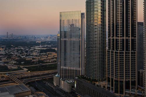 a view of two tall skyscrapers in a city at Vida Dubai Mall in Dubai