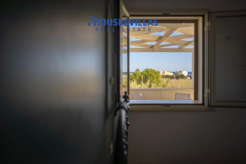 an open door with a view of a window at Villa Zuzana in Calabernardo