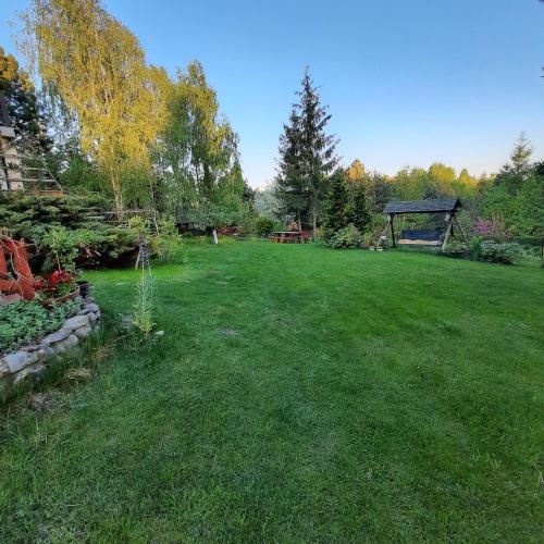 Taman di luar Apartament nad Jeziorem
