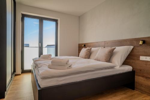 Cama o camas de una habitación en Sunset Apartments