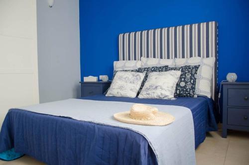 Ένα ή περισσότερα κρεβάτια σε δωμάτιο στο "Mi casita de la playa"