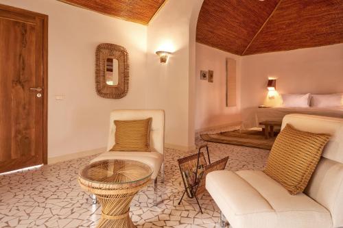 Letto o letti in una camera di Souimanga Lodge