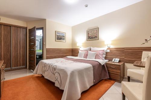 Posteľ alebo postele v izbe v ubytovaní Hotel Soray