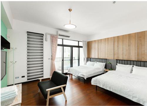 Postel nebo postele na pokoji v ubytování Chenting Yiyu B&B