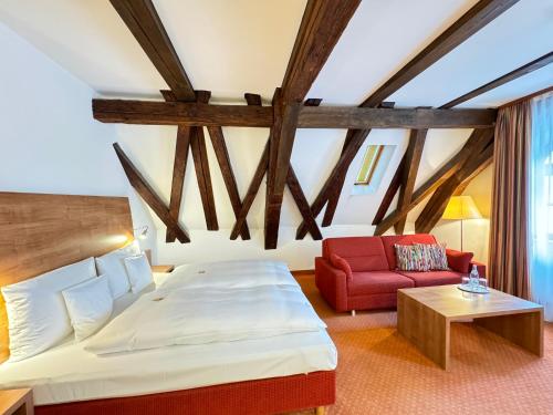 Postel nebo postele na pokoji v ubytování Hotel Haimerlhof