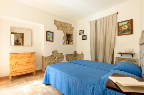 Postel nebo postele na pokoji v ubytování Agriturismo I Gelsi di Santa Cristina