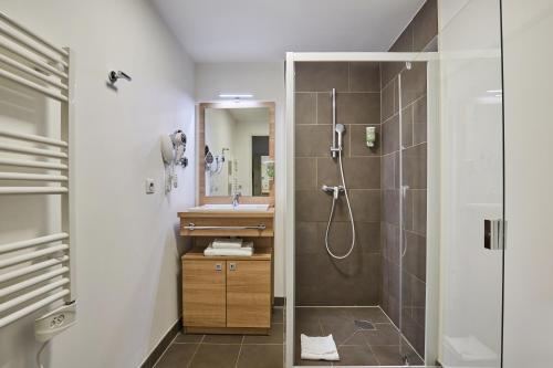 Ένα μπάνιο στο Appart'hôtel Odalys City Campus - Paris Rueil Malmaison