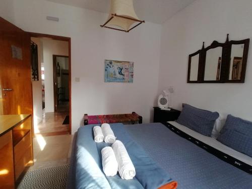 Ένα ή περισσότερα κρεβάτια σε δωμάτιο στο Olive Hostel Lagos