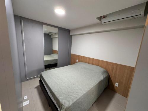 Ένα ή περισσότερα κρεβάτια σε δωμάτιο στο Sea View Apartment in Aracaju