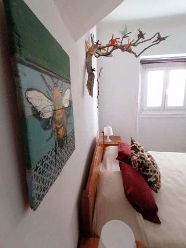 Ένα ή περισσότερα κρεβάτια σε δωμάτιο στο Olive Hostel Lagos