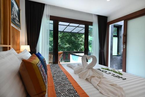 Ein Bett oder Betten in einem Zimmer der Unterkunft Cascade Tara