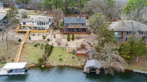 an aerial view of a house on the water at Dock Holiday - Hot Tub - Private Dock in Bella Vista