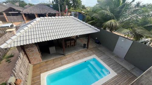 an overhead view of a house with a swimming pool at Casa Vivienda - Barra Grande in Barra Grande