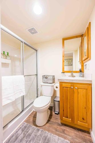 a bathroom with a toilet and a shower and a sink at NEW Nestled Private Tiny Home Situated Near ONP in Port Angeles