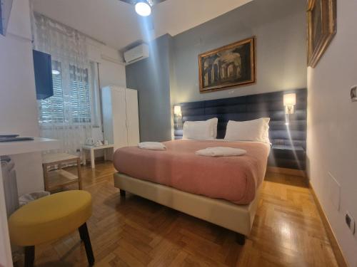 Posteľ alebo postele v izbe v ubytovaní Sweet Home Parioli