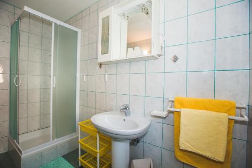 Koupelna v ubytování Apartments Renata