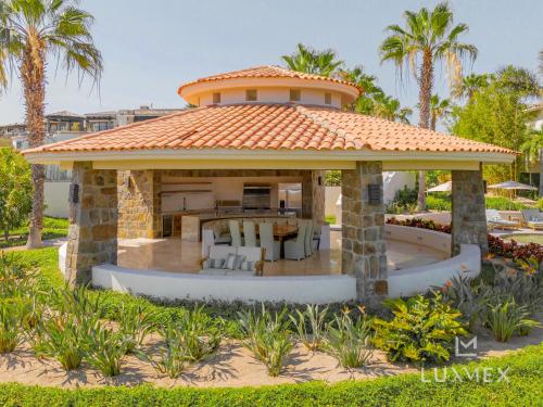 a gazebo with a roof on a beach at Spacious 5 Bd Villa Fully Staffed w Chauffeur in Puerto Los Cabos! in San José del Cabo