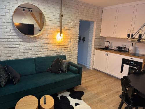 Kuchyň nebo kuchyňský kout v ubytování Apartament SMALL Czarny Potok