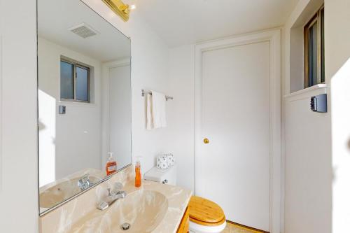 a bathroom with a sink and a toilet at Lake Village Townhouse B in Zephyr Cove