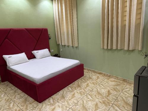 Ένα ή περισσότερα κρεβάτια σε δωμάτιο στο Comfort INN Hotel & Suits
