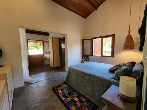 a bedroom with a bed in a room at Casa Terras Altas in Ibicoara