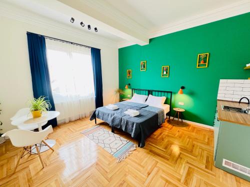 Pirosmani Boutique Aparthotelにあるベッド