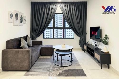 Χώρος καθιστικού στο Arena Designer Deluxe Suite KLIA