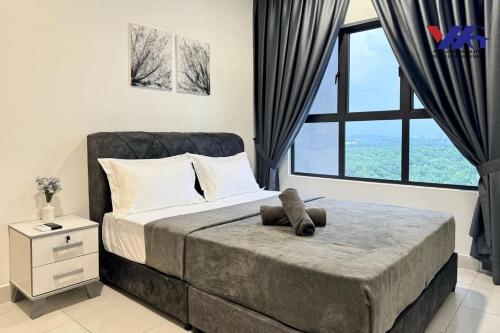 Ένα ή περισσότερα κρεβάτια σε δωμάτιο στο Arena Designer Deluxe Suite KLIA
