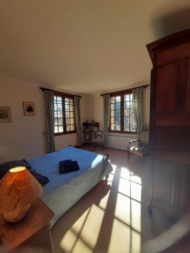 Postel nebo postele na pokoji v ubytování Maison provençale chaleureuse avec piscine