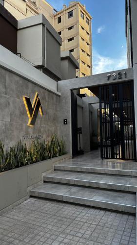 a building with stairs in front of a building at Fancy studio apartment A2 in Cochabamba