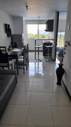 Kuchyň nebo kuchyňský kout v ubytování Apartamentos Piscina a 3 min del Parque del Cafe