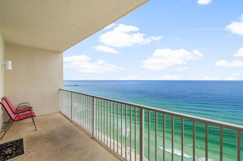 a balcony with a view of the ocean at 20th-floor condo with Gulf views, resort amenities & 2 lagoon-style pools in Panama City Beach
