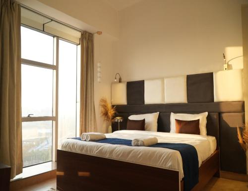 Postel nebo postele na pokoji v ubytování Hotel Nimantrana