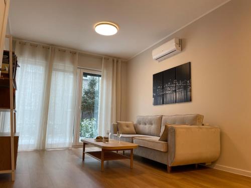 Modern terraced apartment with green garden