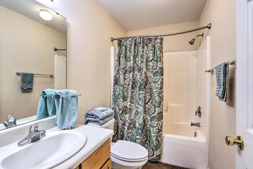 a bathroom with a sink and a toilet and a shower at Tallahassee Townhome 4 Mi to College Town! in Tallahassee
