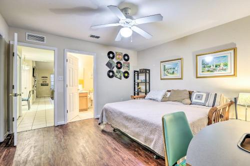 a bedroom with a bed and a ceiling fan at Tallahassee Townhome 4 Mi to College Town! in Tallahassee