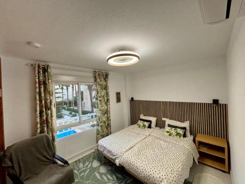 Postel nebo postele na pokoji v ubytování Apartamento Bulevar en Playa Albir
