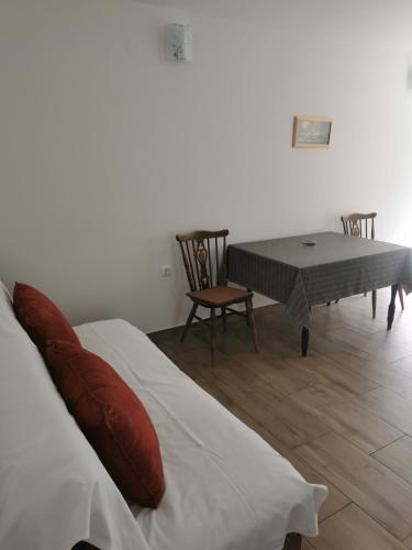 Katil atau katil-katil dalam bilik di Apartmani Rozić Zaostrog