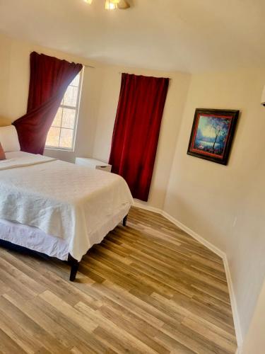 Ένα ή περισσότερα κρεβάτια σε δωμάτιο στο Woodland Apartments