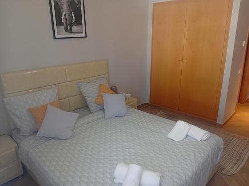 Postel nebo postele na pokoji v ubytování AgadirBay IkenParc centre piscine , et plage à 5mnts à pieds