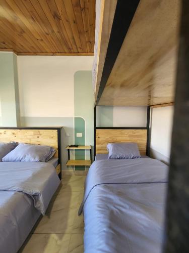 Ένα ή περισσότερα κρεβάτια σε δωμάτιο στο Conexión apartamentos y habitaciones