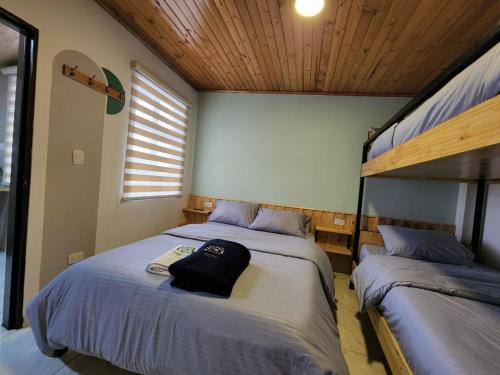 Ένα ή περισσότερα κρεβάτια σε δωμάτιο στο Conexión apartamentos y habitaciones