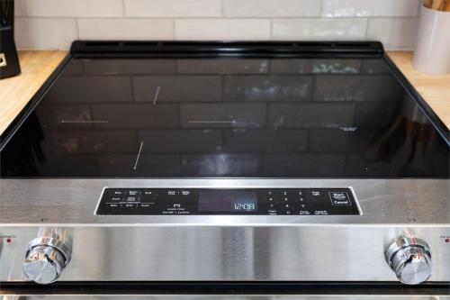 a close up of a stove top in a kitchen at Cabin in the Skye - 5 BDs Lake Harmony in Lake Harmony