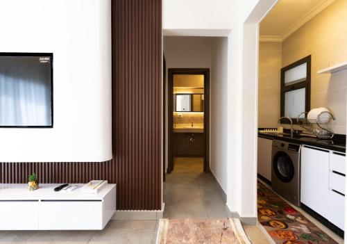 Kuchyň nebo kuchyňský kout v ubytování Madinaty So fancy at Privado